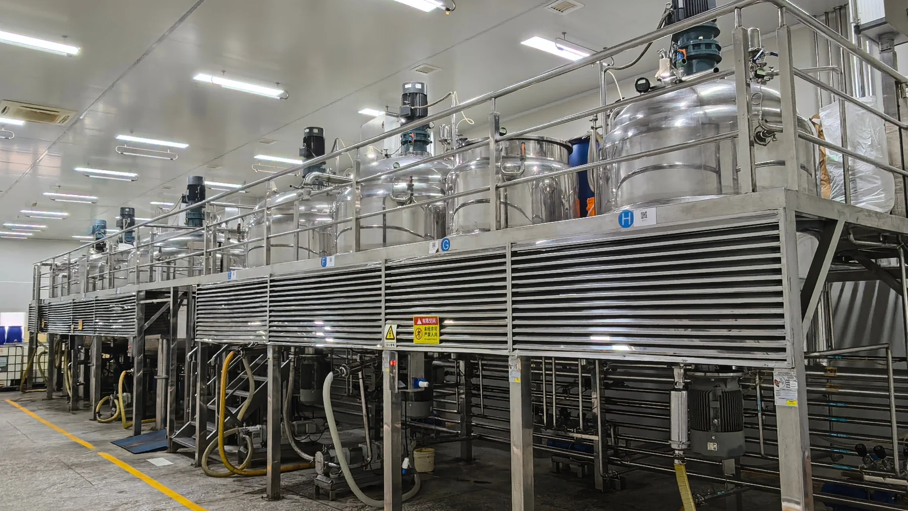 Stainless steel emulsification equipment at Kaiyi's manufacturing facility