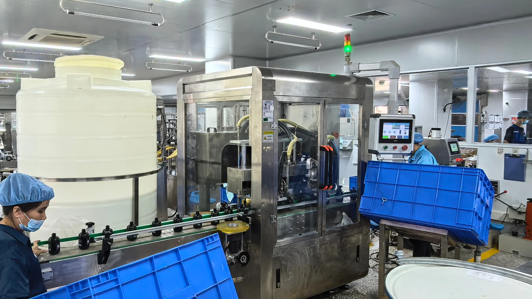 Automated filling line inside Kaiyi's hair care factory